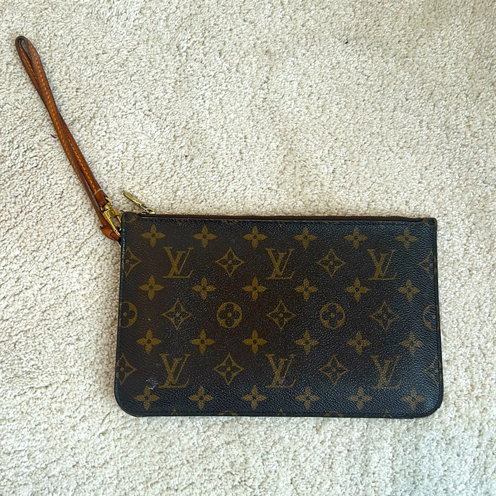 Louis Vuitton Neverfull pouch.